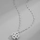 Rotating clover leaf necklace | Accessories